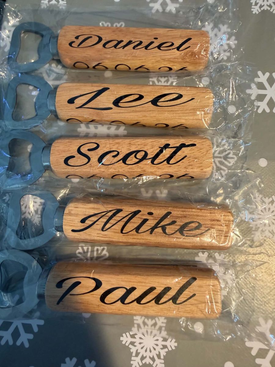Personalised bottle openers with printed names and designs
