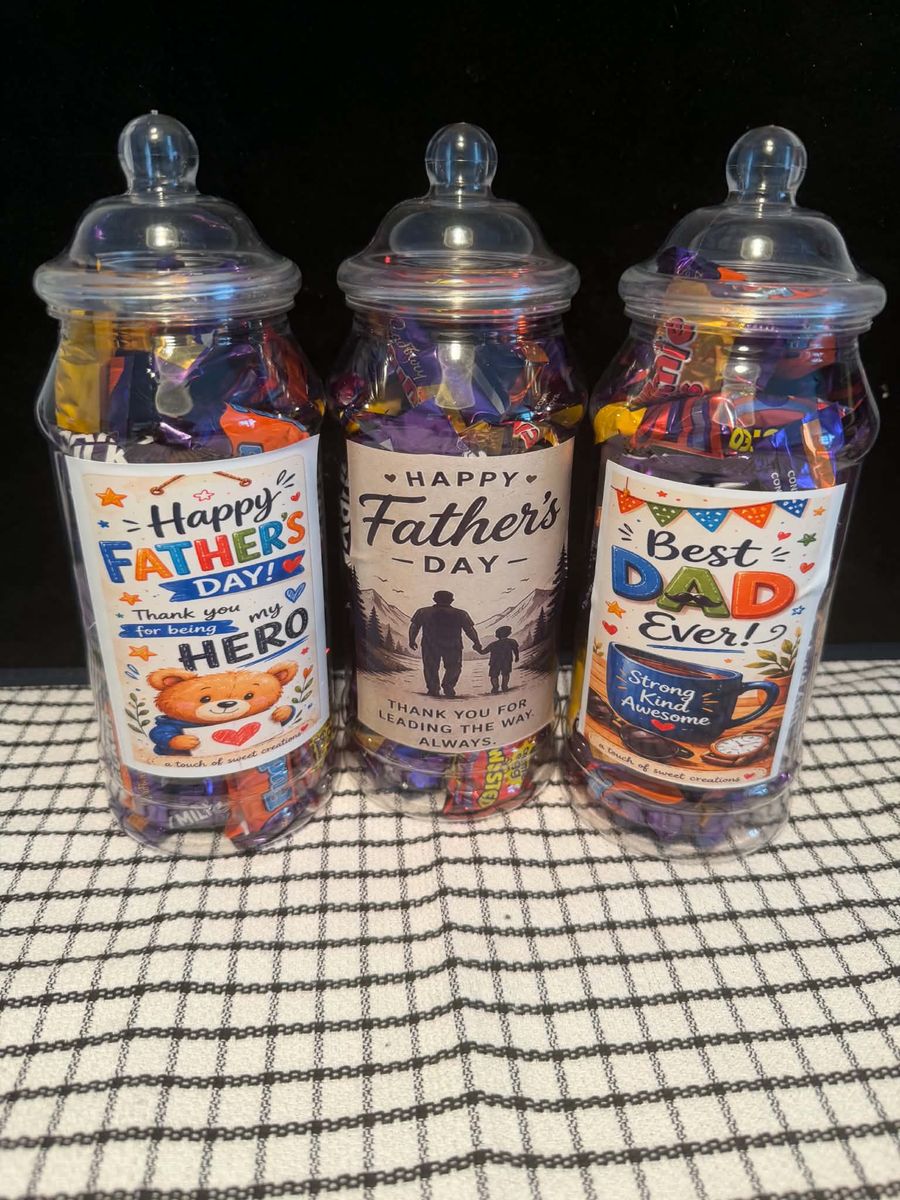Three personalised sweet jars with printed labels